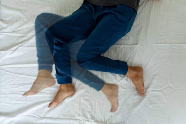 in bed with restless leg syndrome